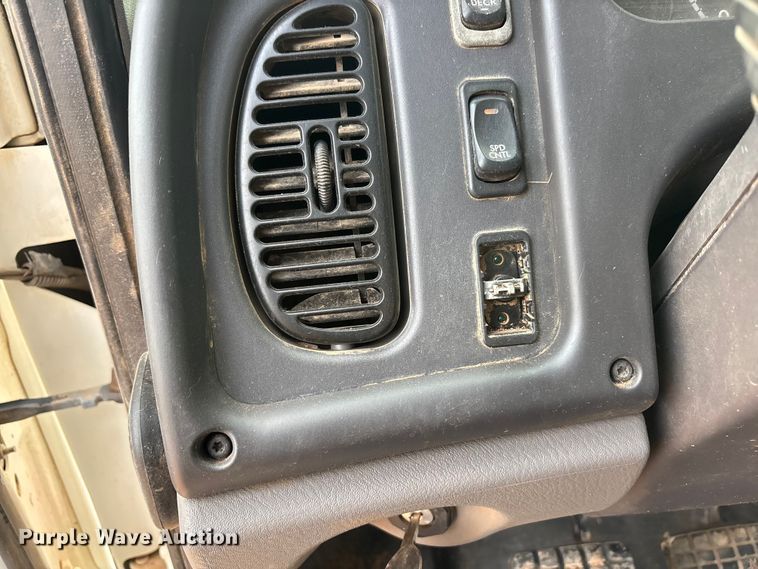 image for item FC2036 2006 Freightliner Business Class M2 flatbed truck with mud mixing truck