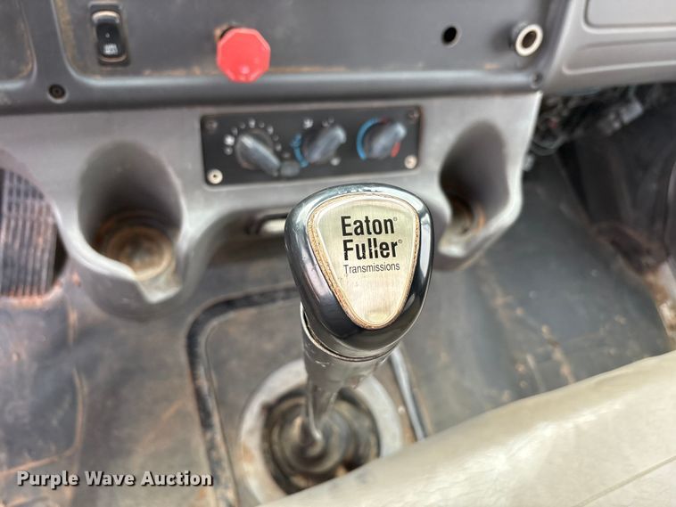 image for item FC2036 2006 Freightliner Business Class M2 flatbed truck with mud mixing truck