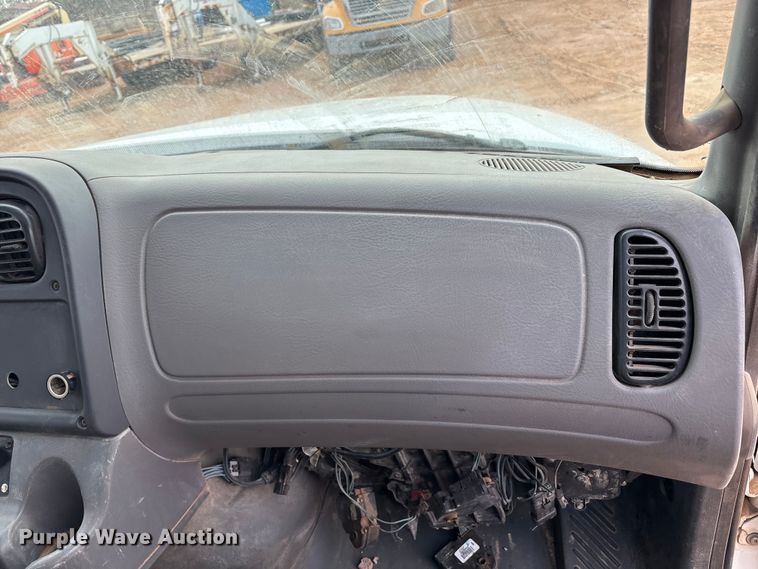 image for item FC2036 2006 Freightliner Business Class M2 flatbed truck with mud mixing truck