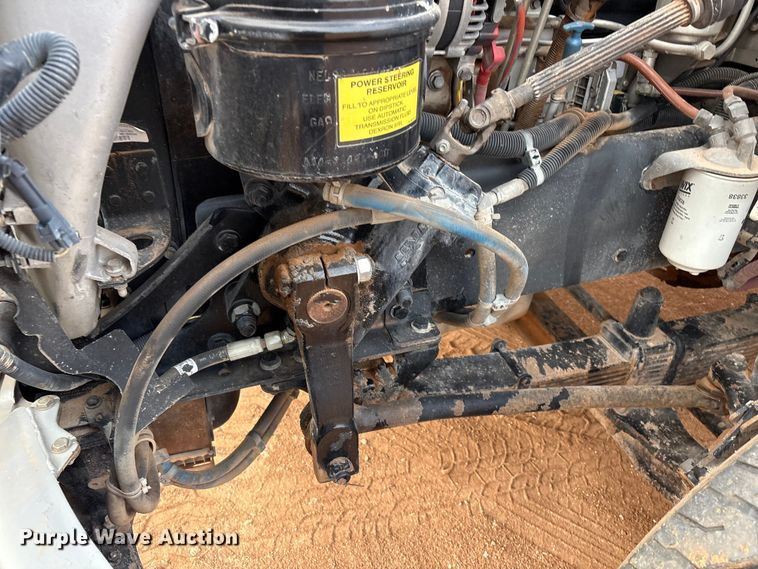 image for item FC2036 2006 Freightliner Business Class M2 flatbed truck with mud mixing truck