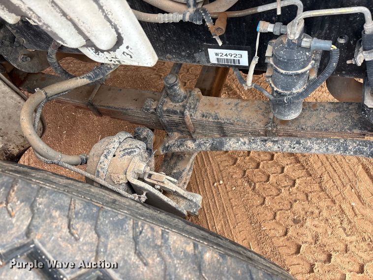 image for item FC2036 2006 Freightliner Business Class M2 flatbed truck with mud mixing truck