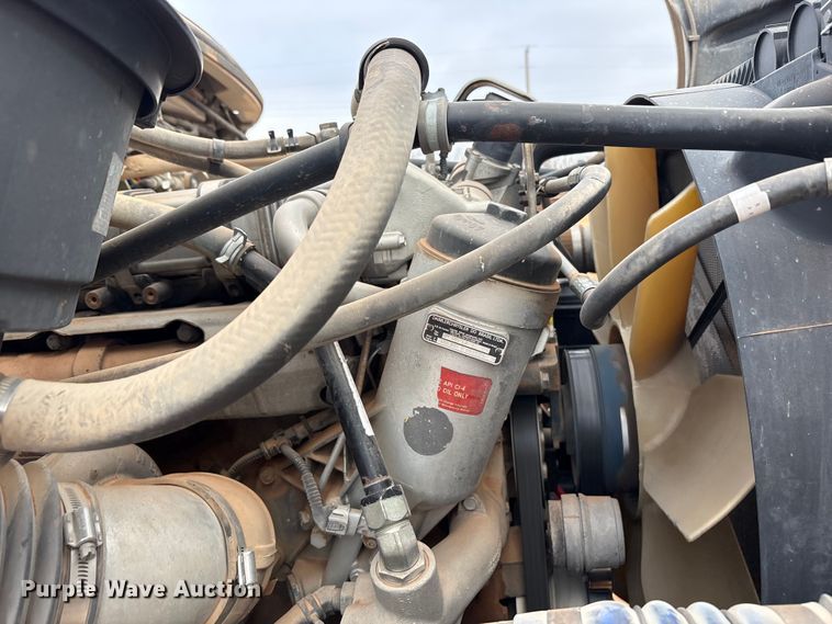 image for item FC2036 2006 Freightliner Business Class M2 flatbed truck with mud mixing truck