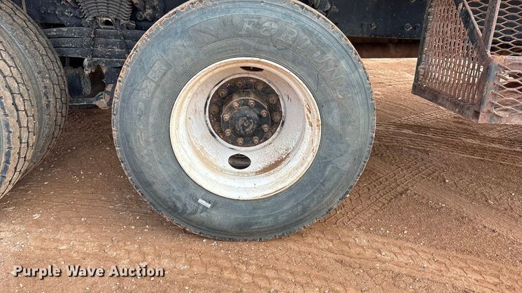 image for item FC2036 2006 Freightliner Business Class M2 flatbed truck with mud mixing truck