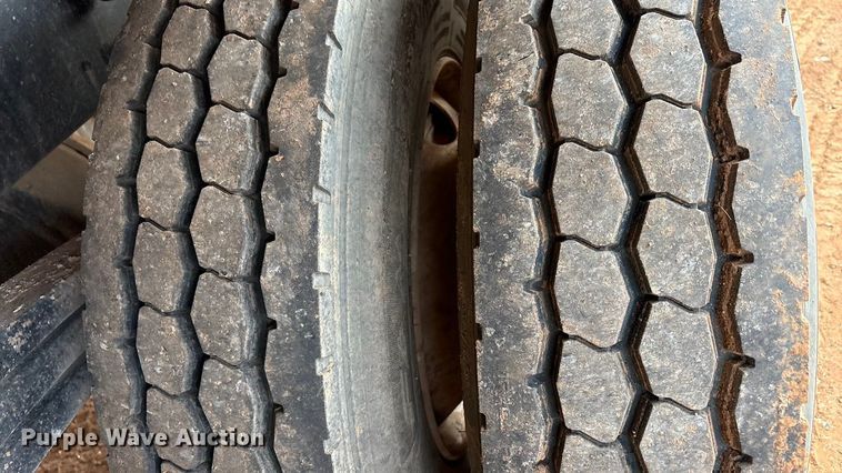 image for item FC2036 2006 Freightliner Business Class M2 flatbed truck with mud mixing truck