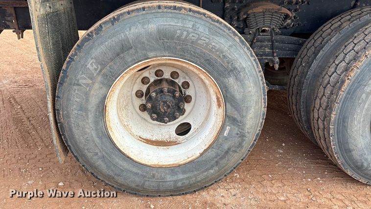 image for item FC2036 2006 Freightliner Business Class M2 flatbed truck with mud mixing truck