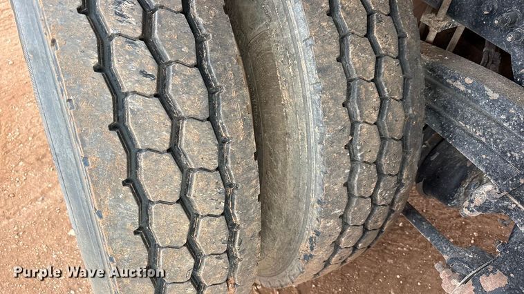 image for item FC2036 2006 Freightliner Business Class M2 flatbed truck with mud mixing truck