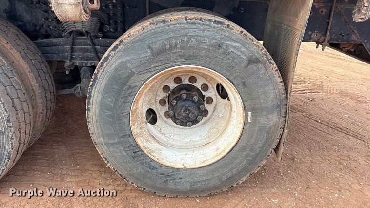 image for item FC2036 2006 Freightliner Business Class M2 flatbed truck with mud mixing truck