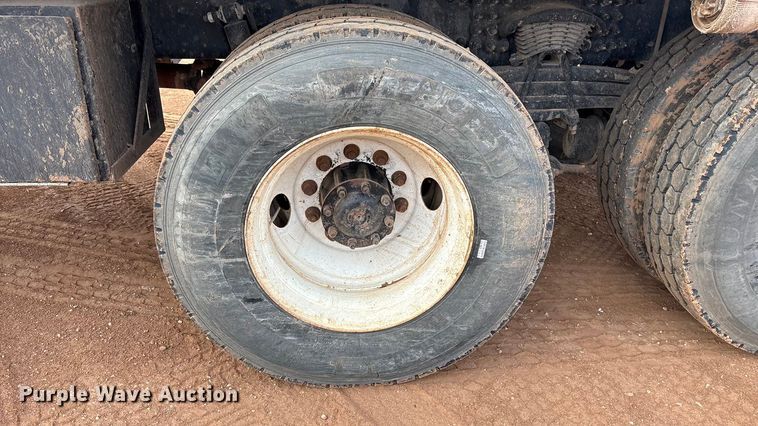 image for item FC2036 2006 Freightliner Business Class M2 flatbed truck with mud mixing truck