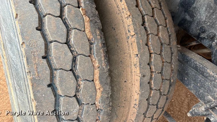 image for item FC2036 2006 Freightliner Business Class M2 flatbed truck with mud mixing truck