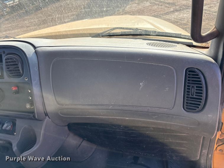 image for item FC2037 2005 Freightliner Business Class M2 flatbed truck with mud mixing system