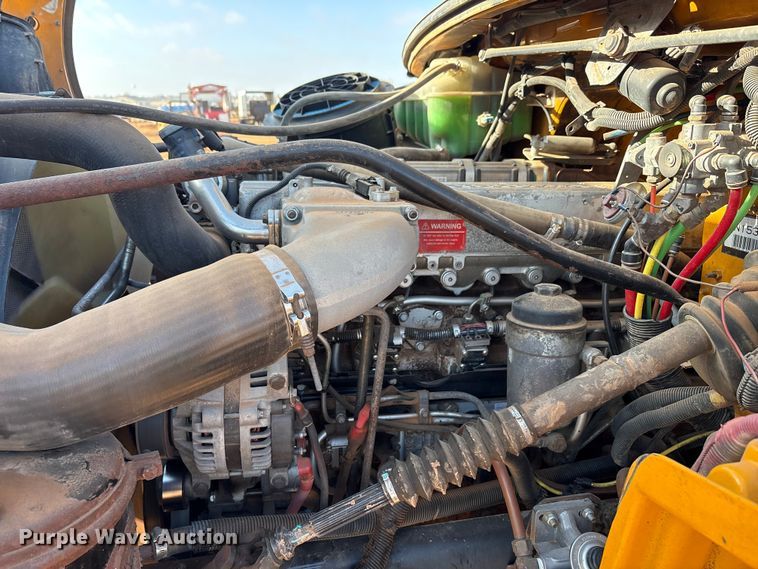 image for item FC2037 2005 Freightliner Business Class M2 flatbed truck with mud mixing system