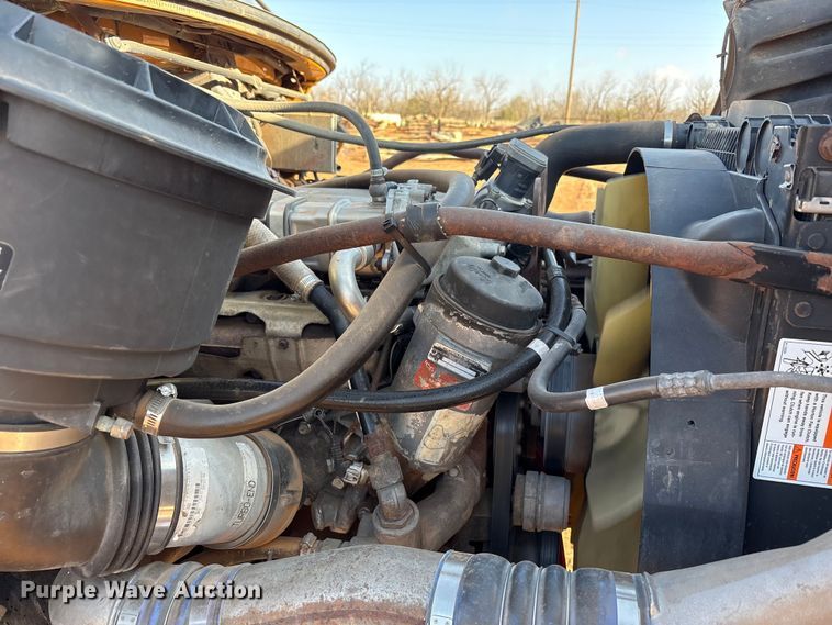 image for item FC2037 2005 Freightliner Business Class M2 flatbed truck with mud mixing system