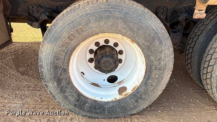 image for item FC2037 2005 Freightliner Business Class M2 flatbed truck with mud mixing system