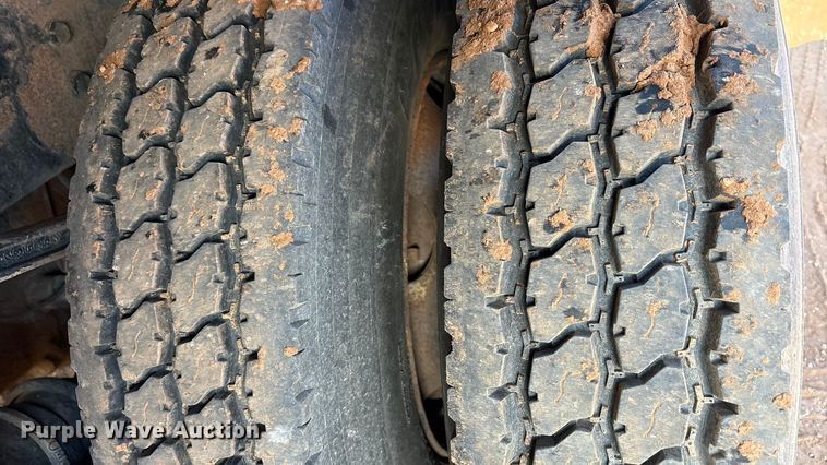 image for item FC2037 2005 Freightliner Business Class M2 flatbed truck with mud mixing system