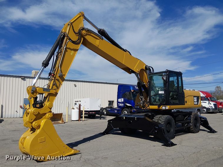 image for item YA2465 2015 Caterpillar M322D wheeled excavator