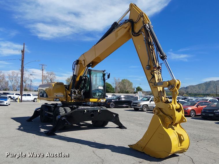 image for item YA2465 2015 Caterpillar M322D wheeled excavator