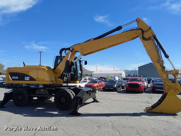image for item YA2465 2015 Caterpillar M322D wheeled excavator