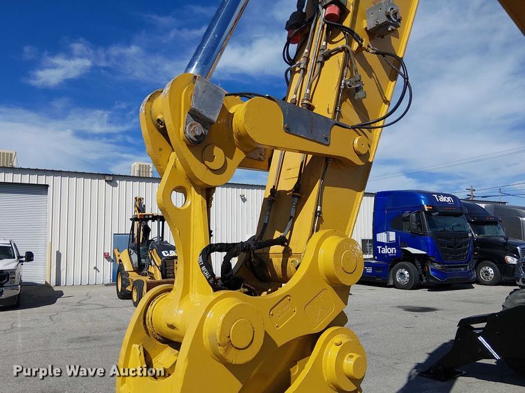 image for item YA2465 2015 Caterpillar M322D wheeled excavator