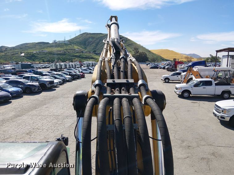 image for item YA2465 2015 Caterpillar M322D wheeled excavator