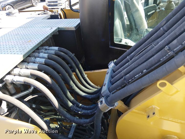 image for item YA2465 2015 Caterpillar M322D wheeled excavator