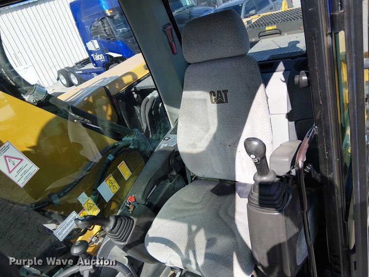 image for item YA2465 2015 Caterpillar M322D wheeled excavator