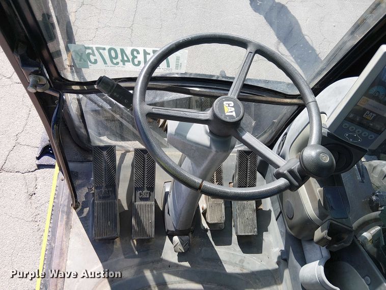 image for item YA2465 2015 Caterpillar M322D wheeled excavator