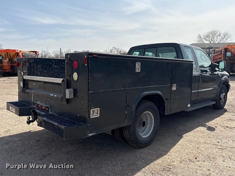 image for item EA4553 2004 Ford F350 Super Duty Ext. Cab utility bed pickup truck