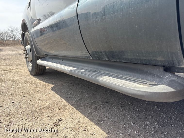 image for item EA4553 2004 Ford F350 Super Duty Ext. Cab utility bed pickup truck