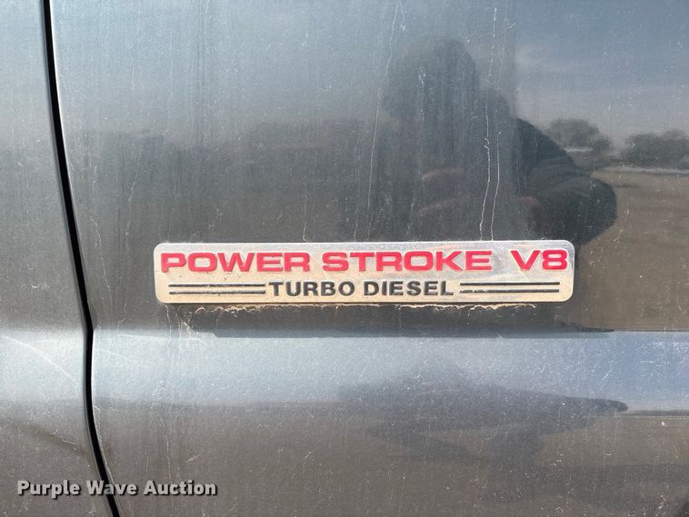 image for item EA4553 2004 Ford F350 Super Duty Ext. Cab utility bed pickup truck