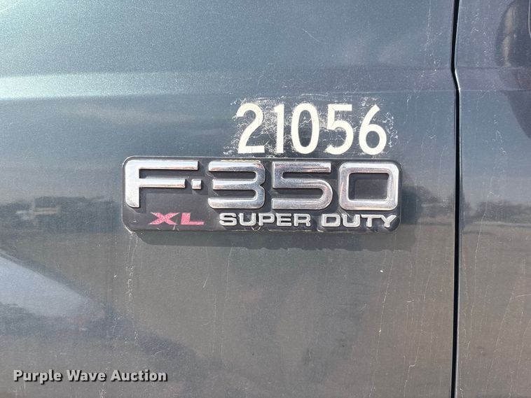 image for item EA4553 2004 Ford F350 Super Duty Ext. Cab utility bed pickup truck