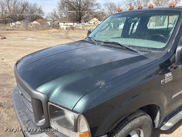 image for item EA4553 2004 Ford F350 Super Duty Ext. Cab utility bed pickup truck