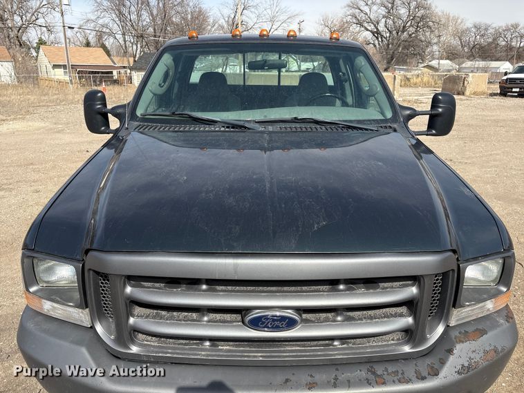 image for item EA4553 2004 Ford F350 Super Duty Ext. Cab utility bed pickup truck