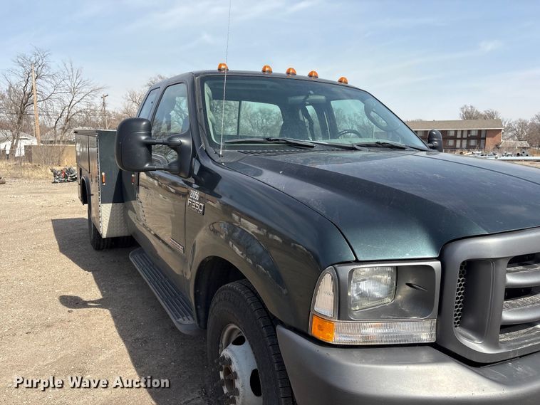image for item EA4553 2004 Ford F350 Super Duty Ext. Cab utility bed pickup truck