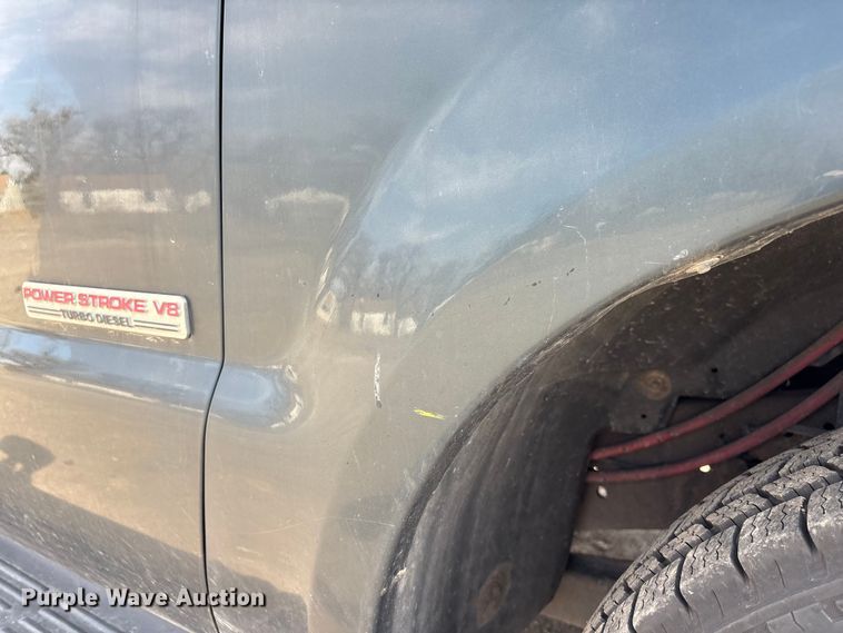 image for item EA4553 2004 Ford F350 Super Duty Ext. Cab utility bed pickup truck