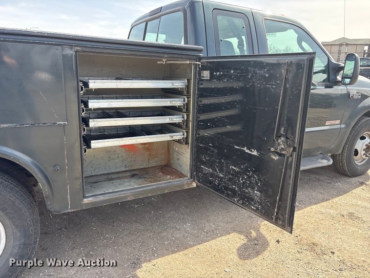 image for item EA4553 2004 Ford F350 Super Duty Ext. Cab utility bed pickup truck