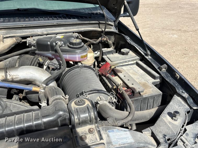 image for item EA4553 2004 Ford F350 Super Duty Ext. Cab utility bed pickup truck