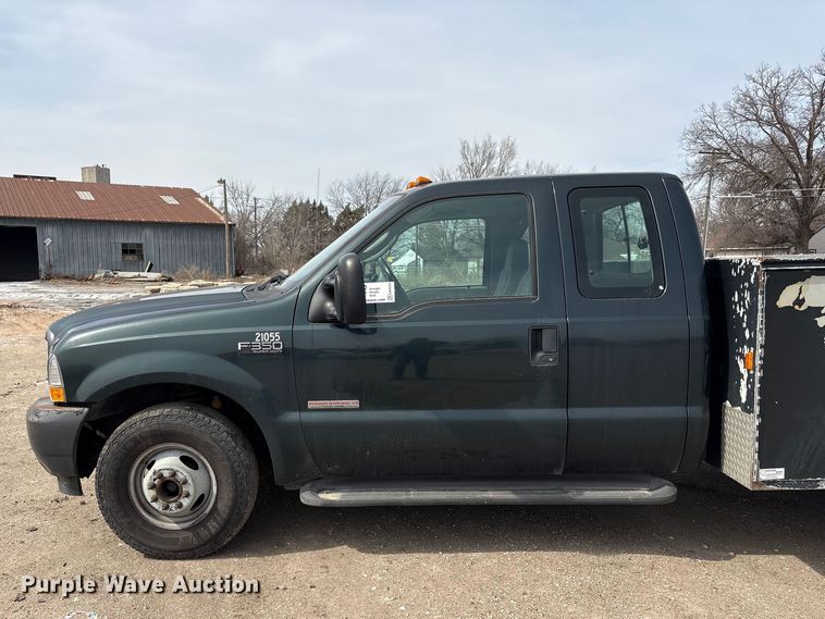 image for item EA4554 2004 Ford F350 Super Duty Ext. Cab utility bed pickup truck