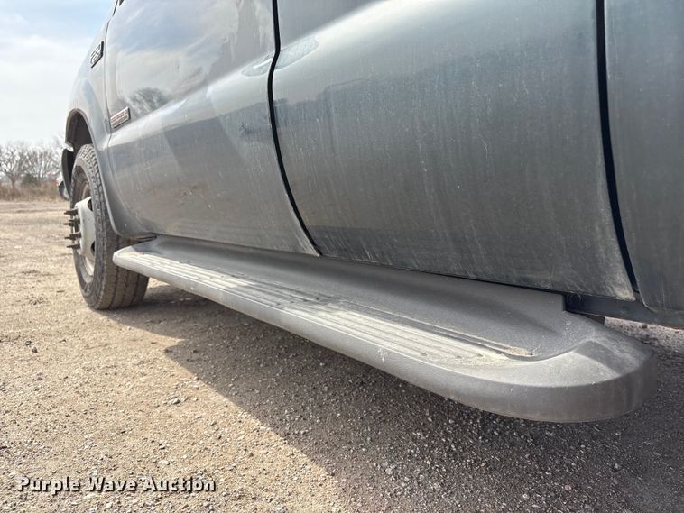 image for item EA4554 2004 Ford F350 Super Duty Ext. Cab utility bed pickup truck