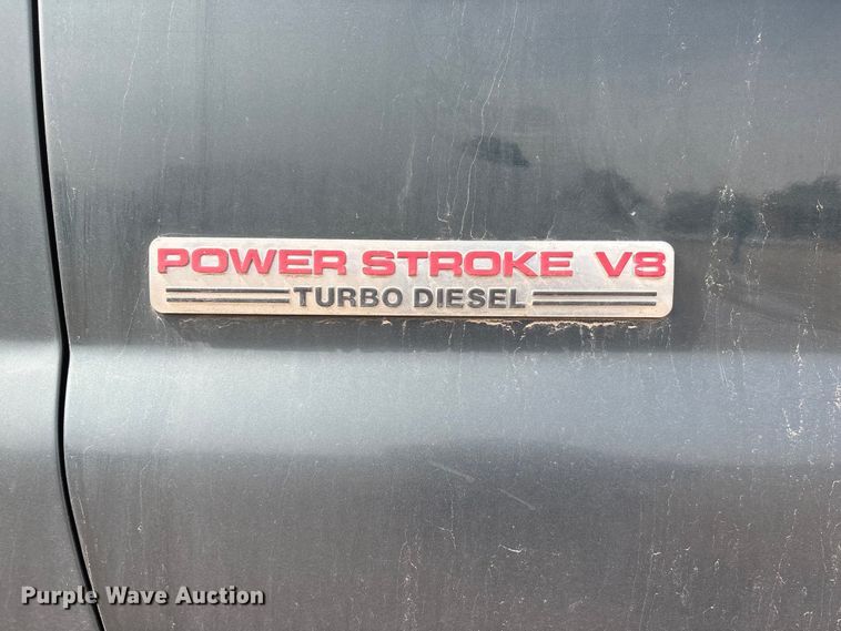 image for item EA4554 2004 Ford F350 Super Duty Ext. Cab utility bed pickup truck