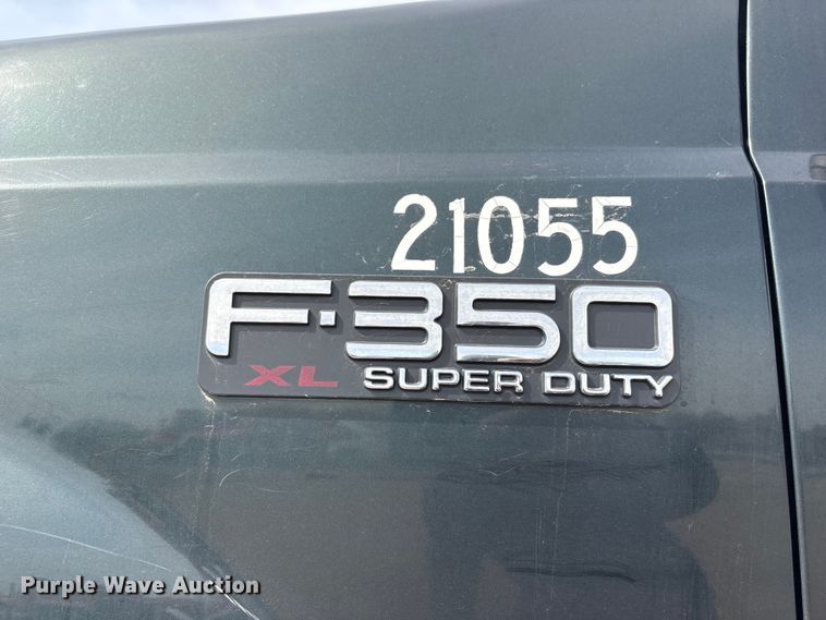 image for item EA4554 2004 Ford F350 Super Duty Ext. Cab utility bed pickup truck