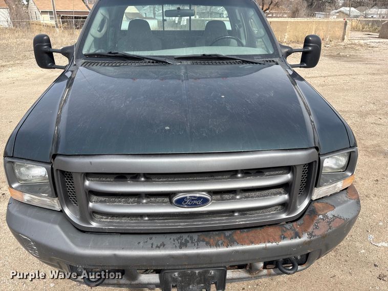 image for item EA4554 2004 Ford F350 Super Duty Ext. Cab utility bed pickup truck