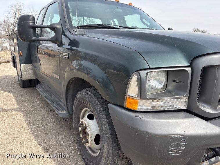 image for item EA4554 2004 Ford F350 Super Duty Ext. Cab utility bed pickup truck