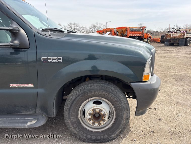 image for item EA4554 2004 Ford F350 Super Duty Ext. Cab utility bed pickup truck