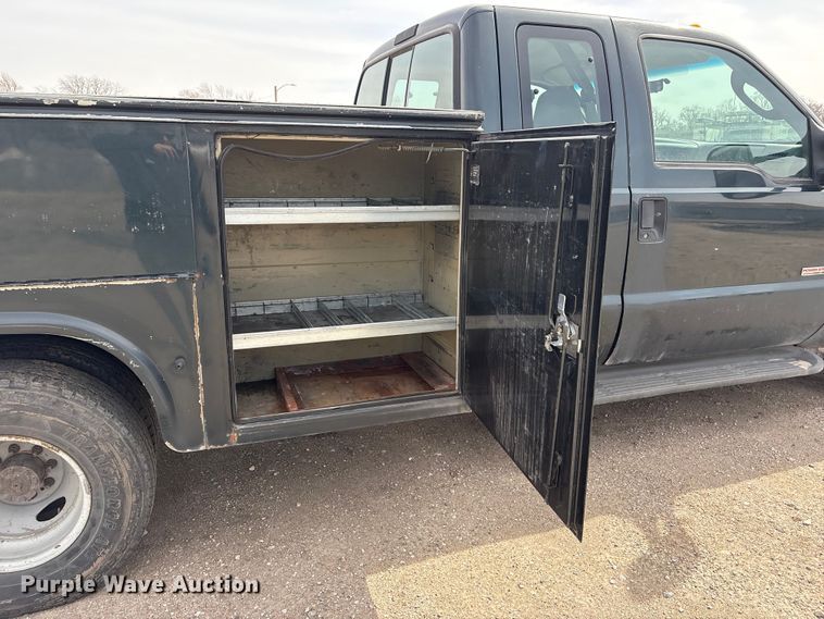 image for item EA4554 2004 Ford F350 Super Duty Ext. Cab utility bed pickup truck