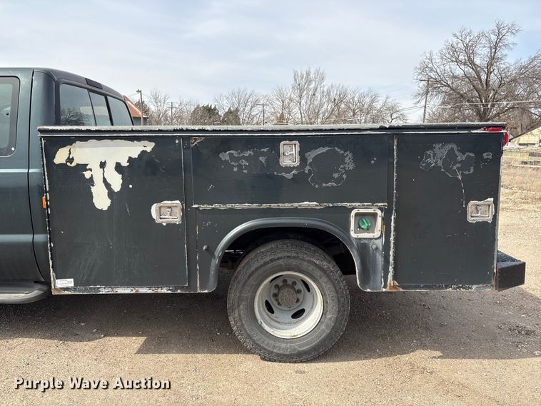 image for item EA4554 2004 Ford F350 Super Duty Ext. Cab utility bed pickup truck