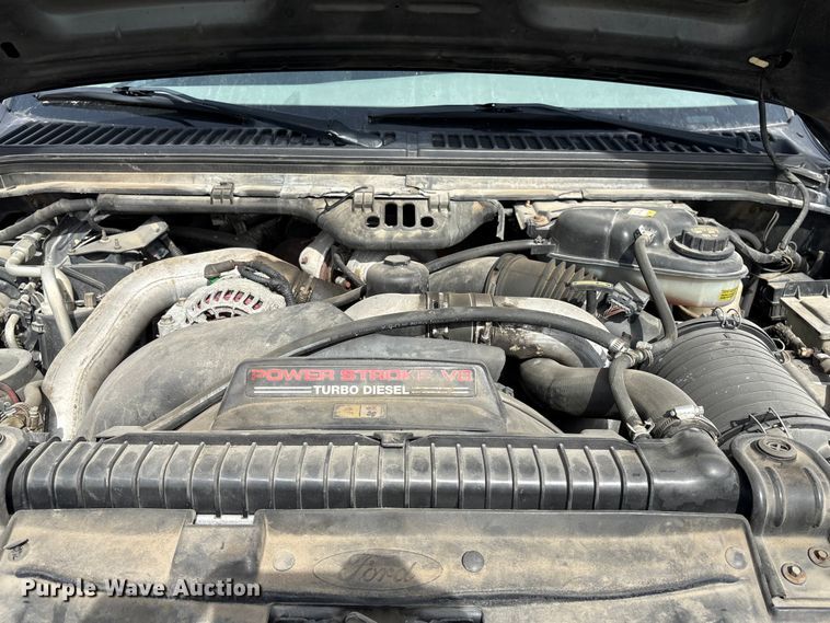 image for item EA4554 2004 Ford F350 Super Duty Ext. Cab utility bed pickup truck