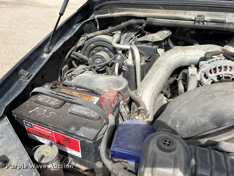 image for item EA4554 2004 Ford F350 Super Duty Ext. Cab utility bed pickup truck