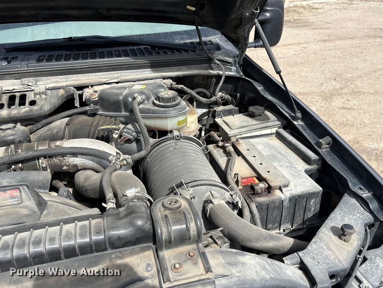 image for item EA4554 2004 Ford F350 Super Duty Ext. Cab utility bed pickup truck