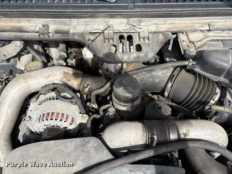 image for item EA4554 2004 Ford F350 Super Duty Ext. Cab utility bed pickup truck