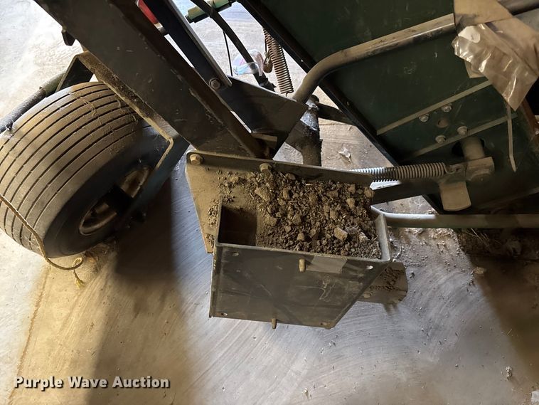 image for item EV2013 Cushman Core Harvester attachment 